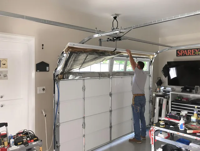 Garage door section replacement by Oxford Garage Door Repair in Oxford