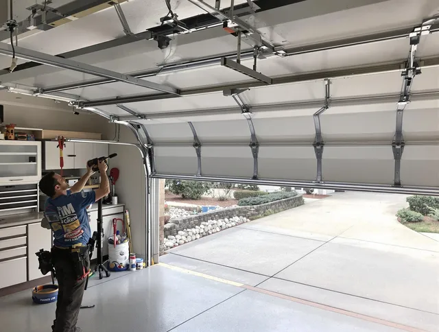 Garage door track repair service by Oxford Garage Door Repair in Oxford